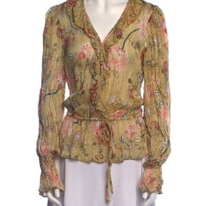 Yellow V-neck long sleeve blouse with ruffled tie front and smocked details